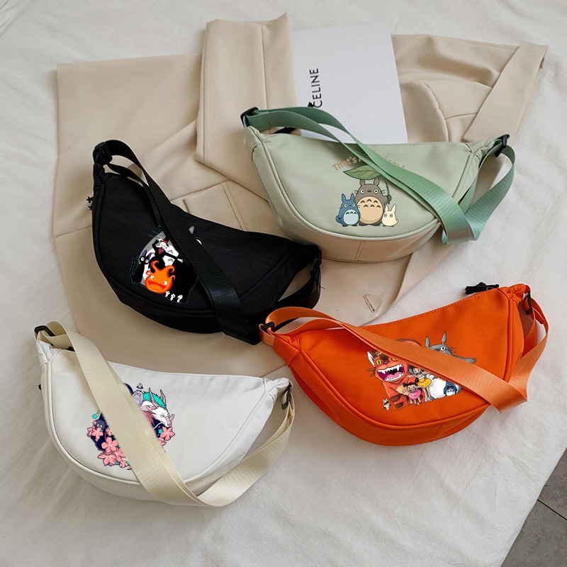 Party Favor Bag - กระเป๋าสะพายข้างโทโทโร่สำหรับผู้หญิงน่ารักการ์ตูนอะนิเมะลายพิมพ์กระเป๋าสะพายไหล่แบบยูนิเซ็กส์ความจุขนาดใหญ่กระเป๋าเป้สะพายหลังแบบพกพาของขวัญปาร์ตี้