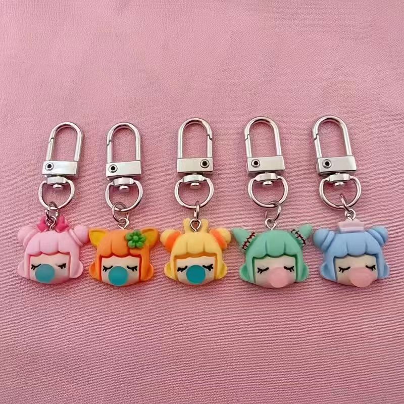 Party Favor Bag - พวงกุญแจเรซินรูปเด็กผู้หญิง 5 ชิ้น เหมาะสำหรับตกแต่งกระเป๋าและอุปกรณ์ในรถยนต์ เป็นของขวัญที่ดีเยี่ยม